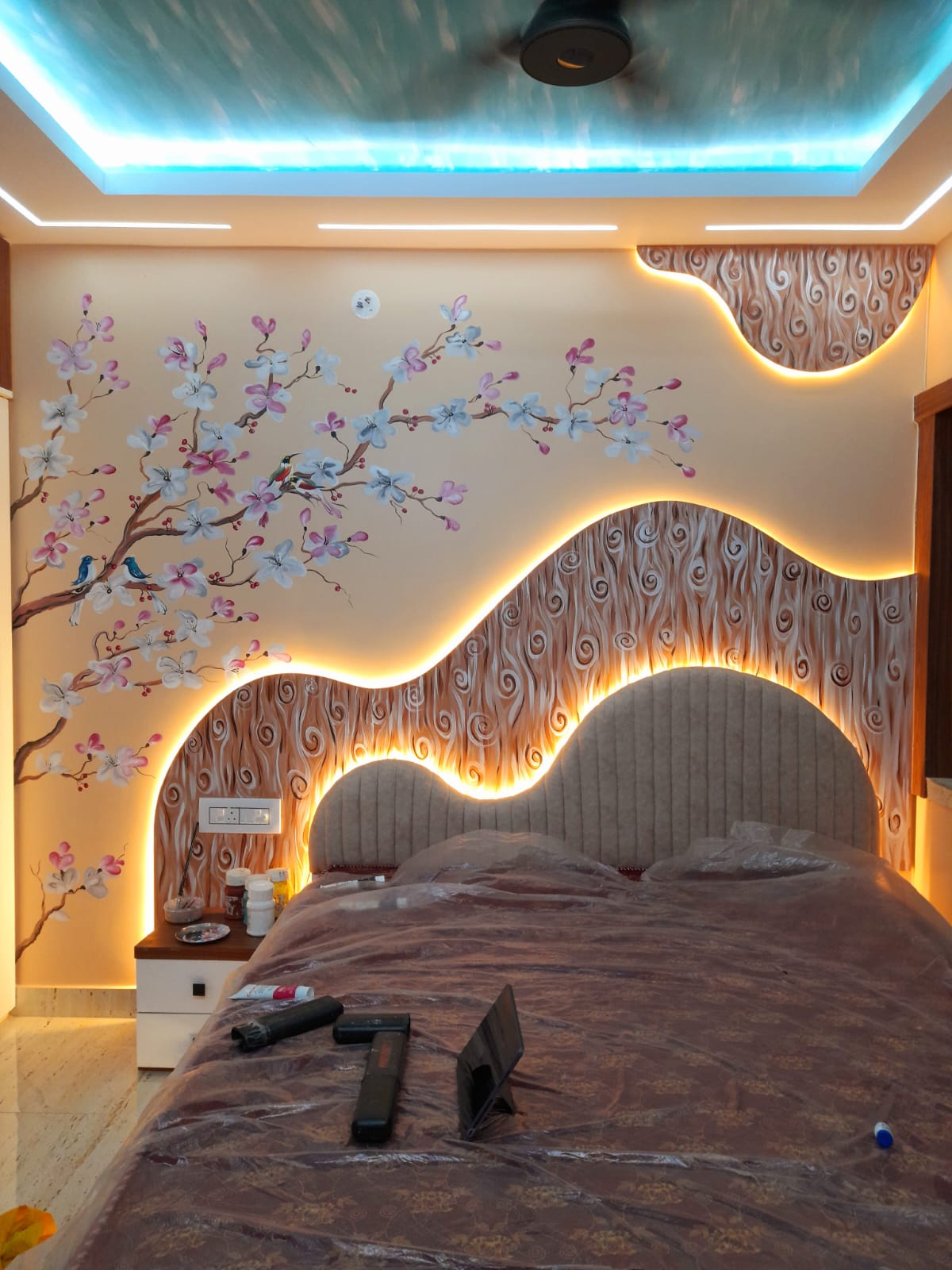 Bedroom wall painting and lighting design